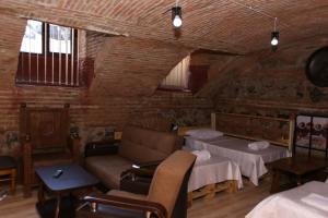 Postel nebo postele na pokoji v ubytování Guest House Kakabadzeebi 9
