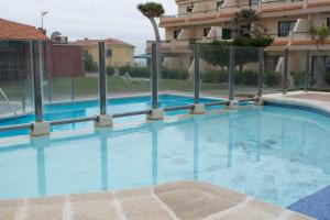 Bazén v ubytování Los Cancajos Apartamento Acijoa nebo v jeho okolí
