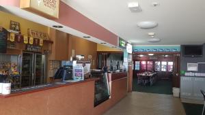 The lobby or reception area at Sarina Hotel