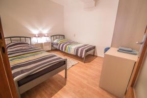 Postel nebo postele na pokoji v ubytování Apartment Marina