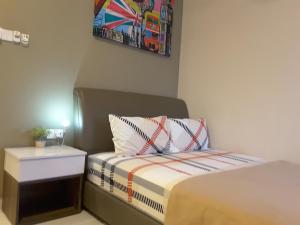 Postel nebo postele na pokoji v ubytování Laman Kurnia Holiday House