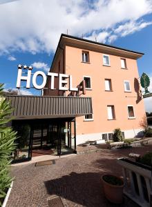 a hotel with a sign on the front of it at Hotel La Pioppa in Bologna