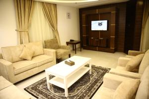 Χώρος καθιστικού στο AlKamil Hotel