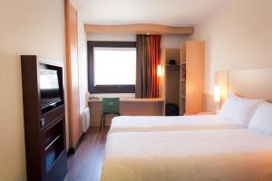 Postel nebo postele na pokoji v ubytování ibis Grenoble Gare