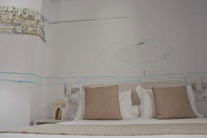Postel nebo postele na pokoji v ubytování La Pasajera Hostal Boutique