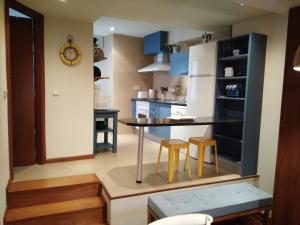 Kuchyň nebo kuchyňský kout v ubytování Apartamentos Nuncio Viejo