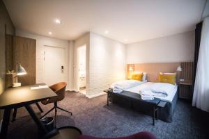 Letto o letti in una camera di Comwell Holte