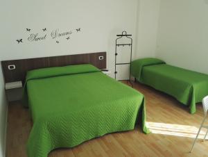 Posteľ alebo postele v izbe v ubytovaní Like Home Cisanello