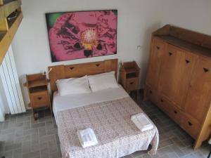 Postel nebo postele na pokoji v ubytování Orto delle Fate