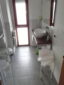 Kúpeľňa v ubytovaní Like Home Cisanello