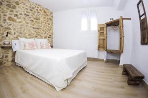 Postel nebo postele na pokoji v ubytování Navazos