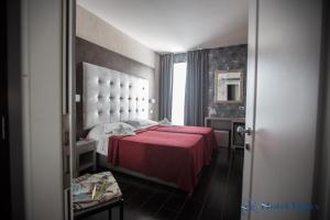 Postel nebo postele na pokoji v ubytování Hotel Relax Roma Nord