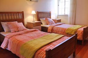 Postel nebo postele na pokoji v ubytování OurMadeira - Casa Vista Bela, countryside