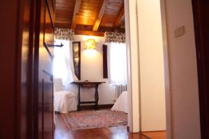 A bed or beds in a room at Villa Belfiore