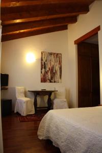 A bed or beds in a room at Villa Belfiore