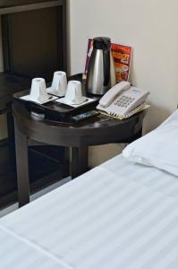 Postel nebo postele na pokoji v ubytování Hotel Formosa Daet