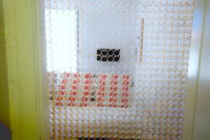 a bathroom with a shower with a glass door at Villa Alba in Acitrezza