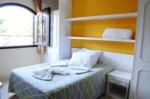 Кровать или кровати в номере Hotel Gramado da Serra +20 фотографий