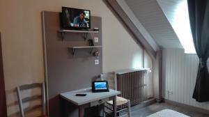 TV a/nebo společenská místnost v ubytování Hotel Valérie