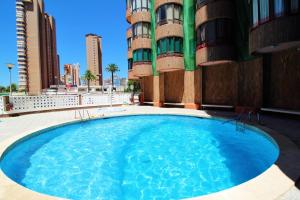 The swimming pool at or close to Apartamento Exclusivo en la Playa 9
