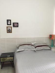 Cama o camas de una habitación en Posto 4- praia Copacabana 509