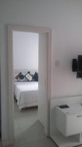 Cama o camas de una habitación en Posto 4- praia Copacabana 509