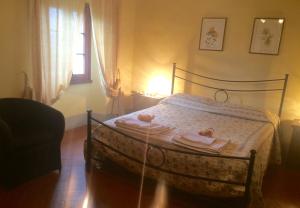 En eller flere senge i et værelse på B & B San Jacopo