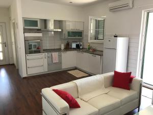 Kuchyň nebo kuchyňský kout v ubytování Apartment Olic