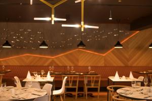 مطعم أو مكان آخر لتناول الطعام في Pillo Hotel & Leisure Club