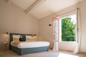 Giường trong phòng chung tại Domaine de Saint Clair