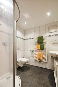 Ванная комната в Pension Bergland