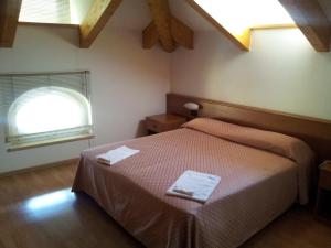 Cama o camas de una habitación en Hotel Vittoria