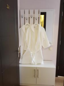 Voodi või voodid majutusasutuse Garden Hotel toas