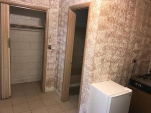 Een badkamer bij Flamingo Motel Marshalltown