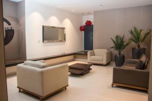 TV a/nebo společenská místnost v ubytování Downtown Apartments "Altos del Sur"
