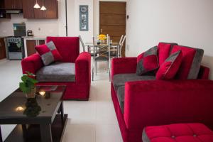 Posezení v ubytování Downtown Apartments "Altos del Sur"