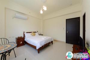 מיטה או מיטות בחדר ב-Sand Po Dang B&B II