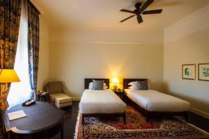 Voodi või voodid majutusasutuse Galle Face Hotel toas