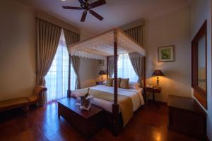 Voodi või voodid majutusasutuse Galle Face Hotel toas