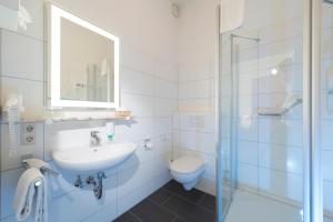 Ein Badezimmer in der Unterkunft Atlantic Hotel Garni