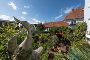 Ein Garten an der Unterkunft Atlantic Hotel Garni