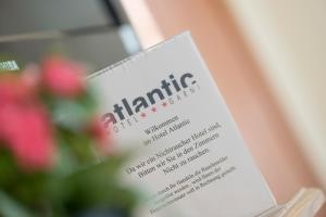 Ein Zertifikat, Auszeichnung, Logo oder anderes Dokument, das in der Unterkunft Atlantic Hotel Garni ausgestellt ist