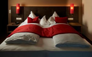 Voodi või voodid majutusasutuse Hotel Gantkofel toas