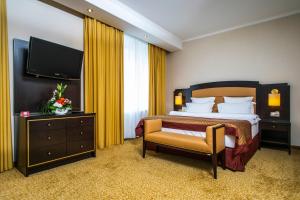 Katil atau katil-katil dalam bilik di Arbat Hotel