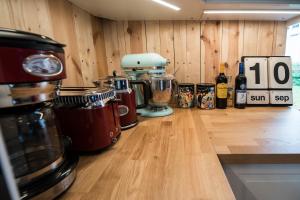 Cuisine ou kitchenette dans l'établissement Tangs