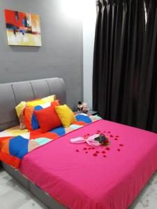 Postel nebo postele na pokoji v ubytování JB Homestay Bukit Indah WiFi CIQ Mall Legoland Free Parking
