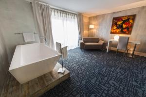 Posezení v ubytování Hôtel Le Dormeur