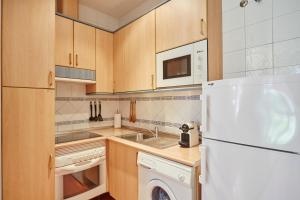 Kuchnia lub aneks kuchenny w obiekcie LEEWAYS LOFT in FUENCARRAL
