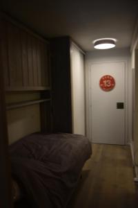 Rúm í herbergi á Little Suite Val d'Isère
