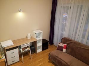 Posedenie v ubytovaní Apartamenty i Pokoje przy Parku